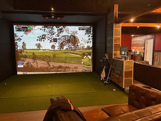 Indoor golf simulators at the Play Thru Golf Lounge in Salmon Arm
