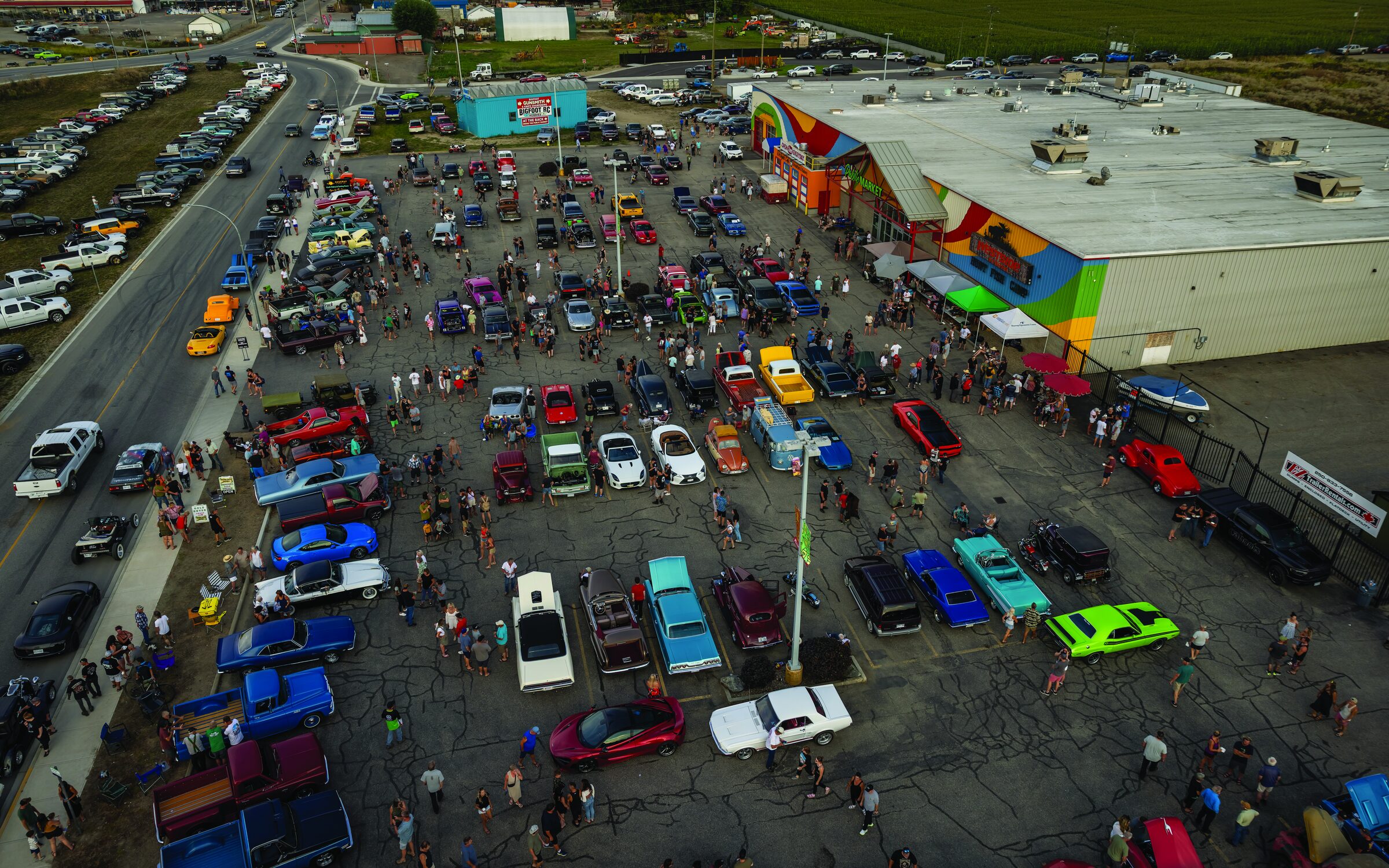 An aerial view of classic cars filling the Westgate Public Market lot for the Lakeview Cruise-In